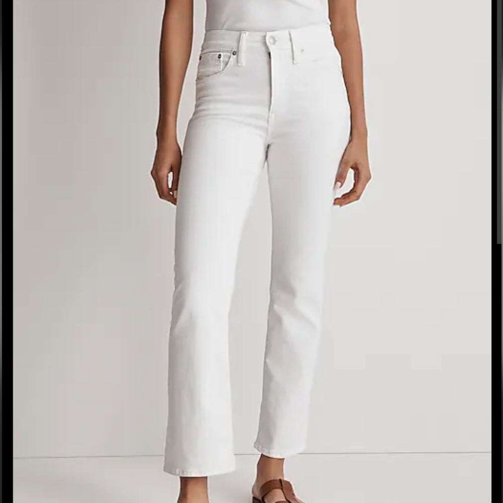 Made well white slightly flared, slightly cropped jeans.